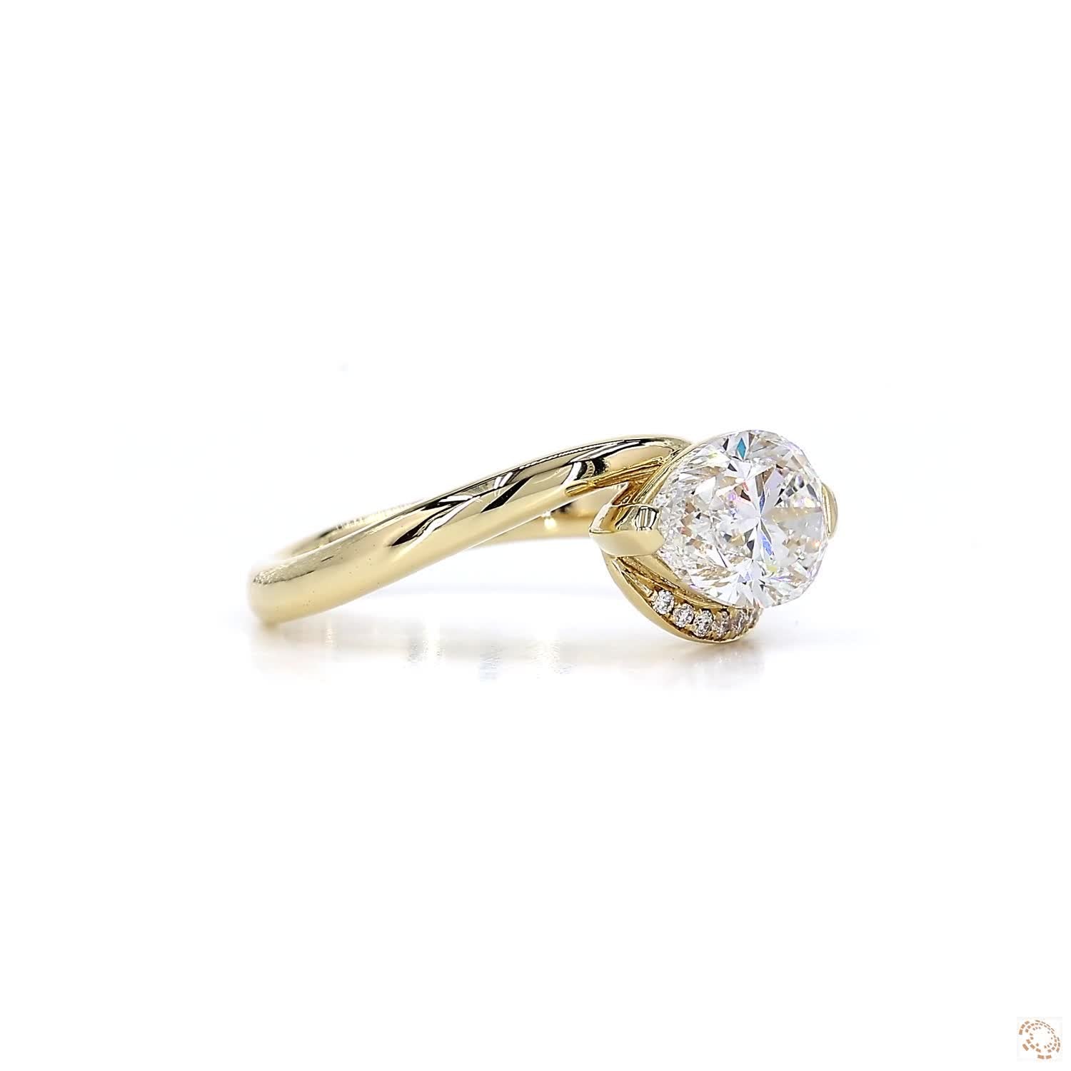 East-West Pear Shape Diamond Ring