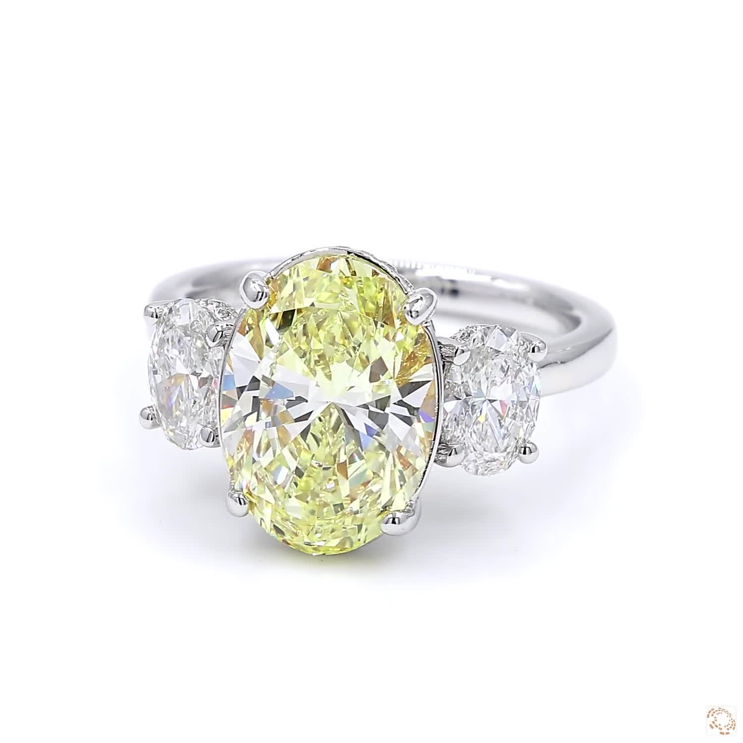 Three Stone Oval Fancy Yellow Diamond Engagement Ring