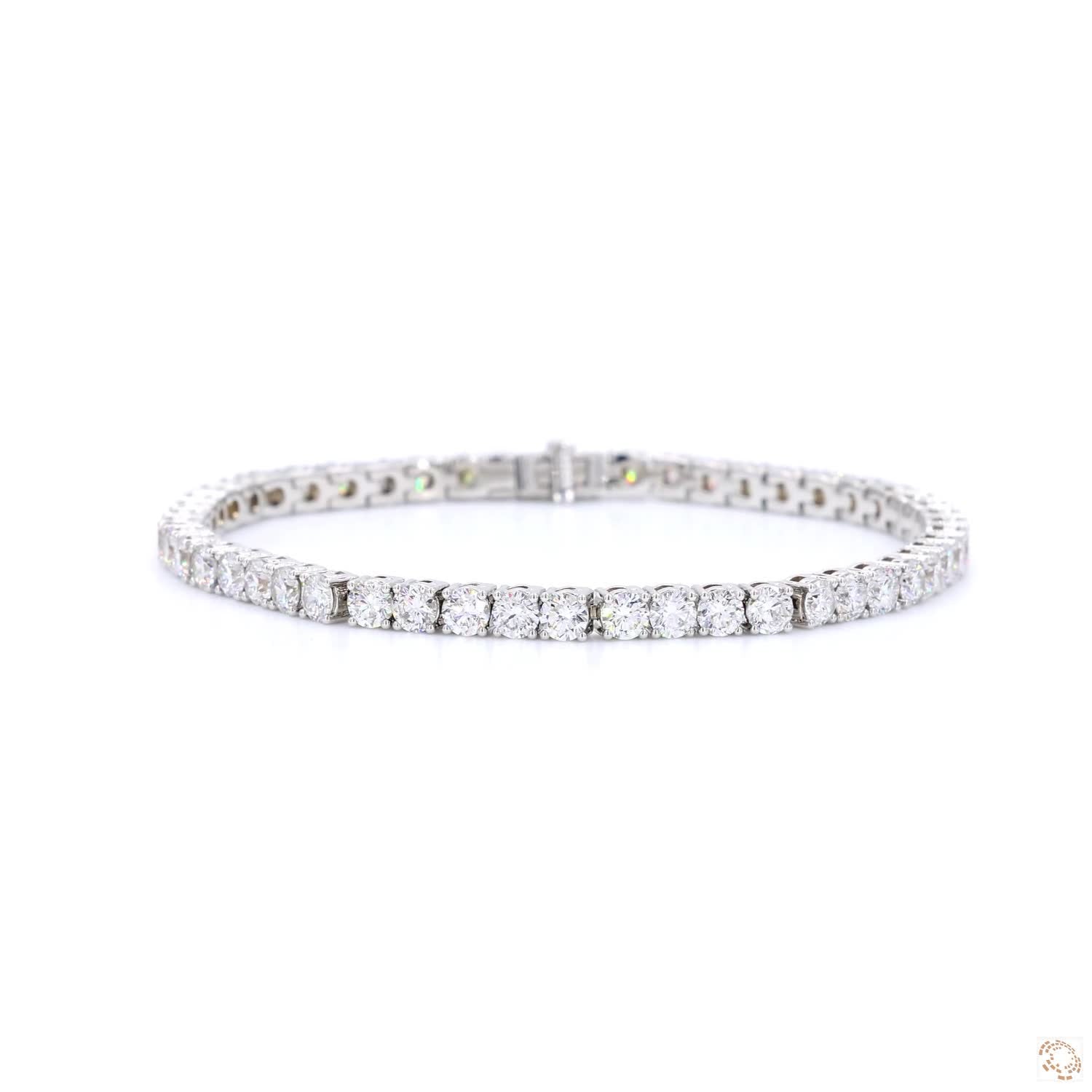 A tennis bracelet with 45 lab-grown diamonds set in a classic four-prong setting in 18K white gold.