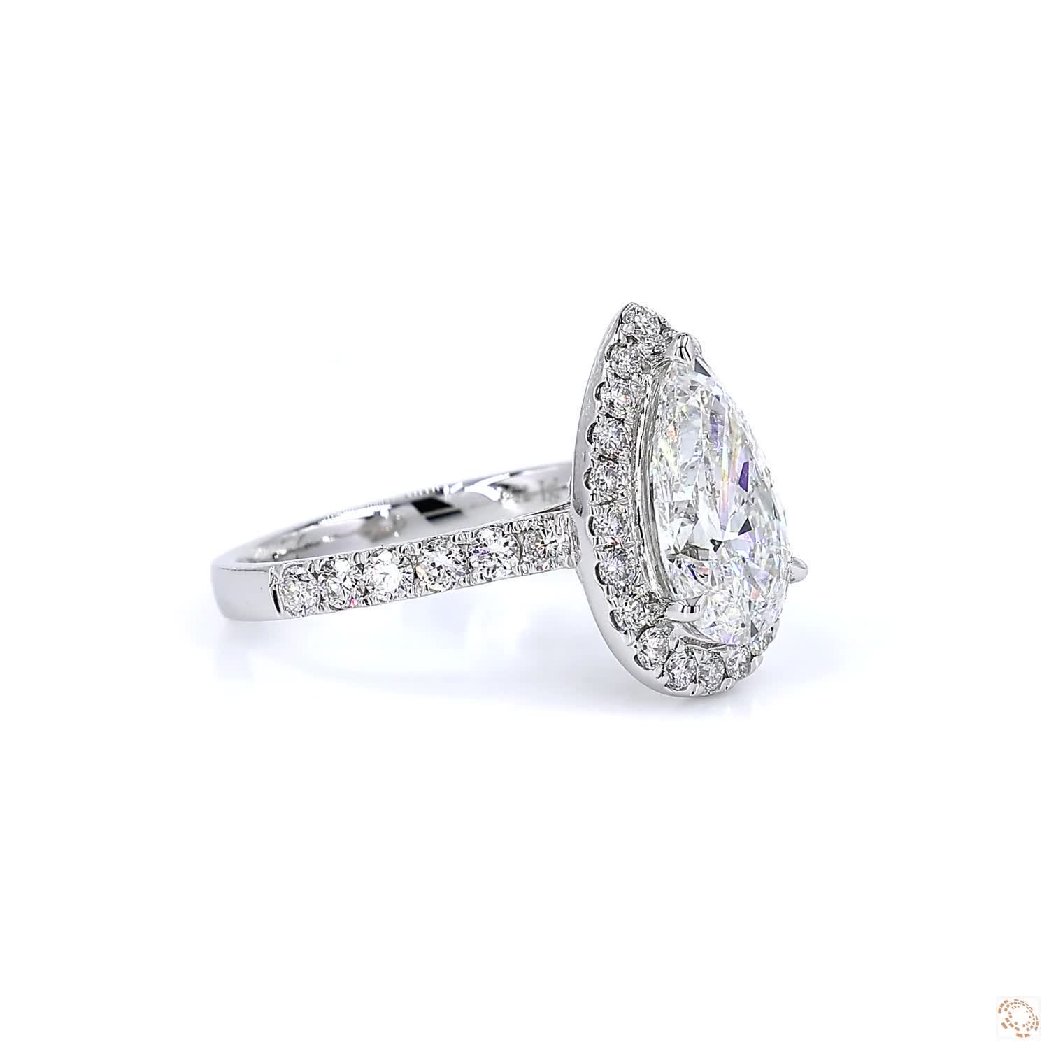 Pear Shape Halo Diamond Ring (2.16 per diamond)