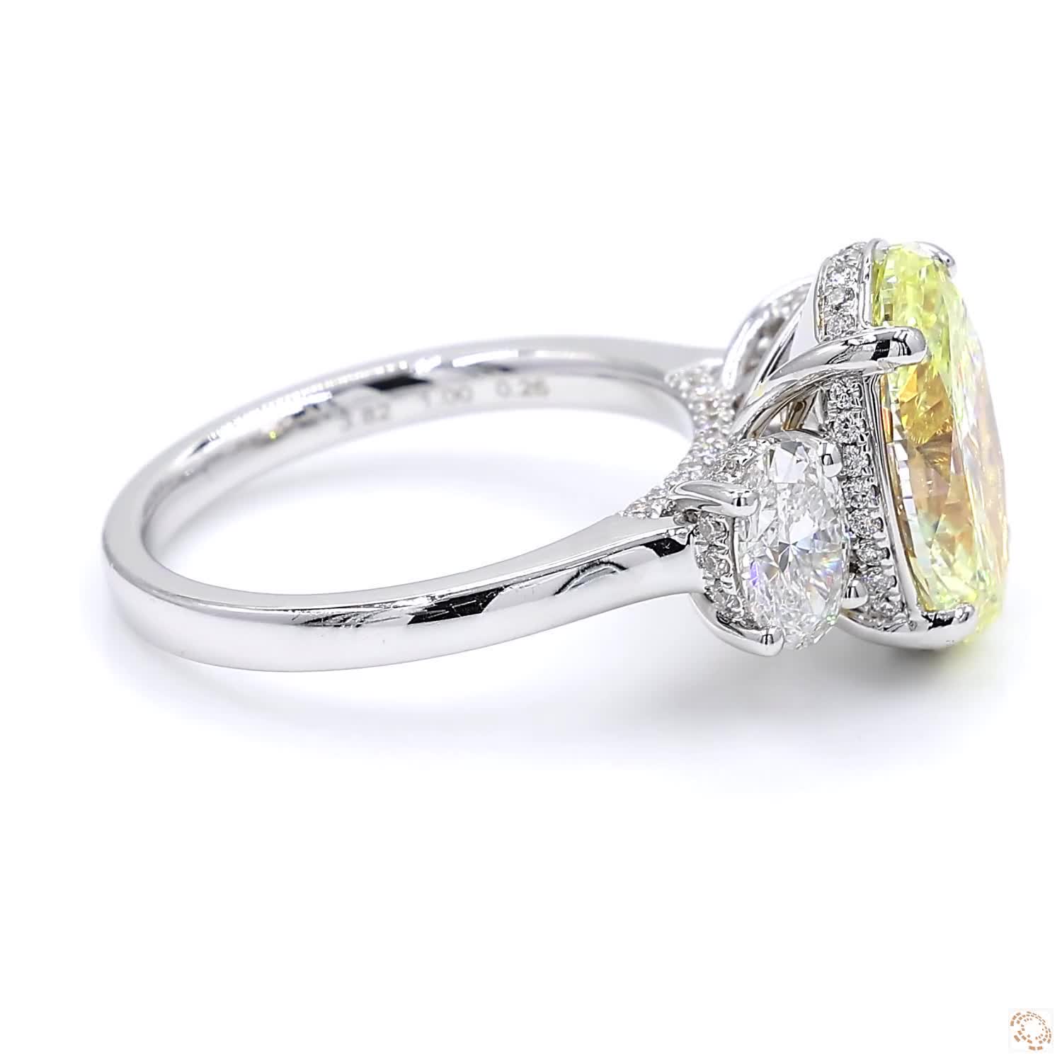 Three Stone Oval Fancy Yellow Diamond Engagement Ring