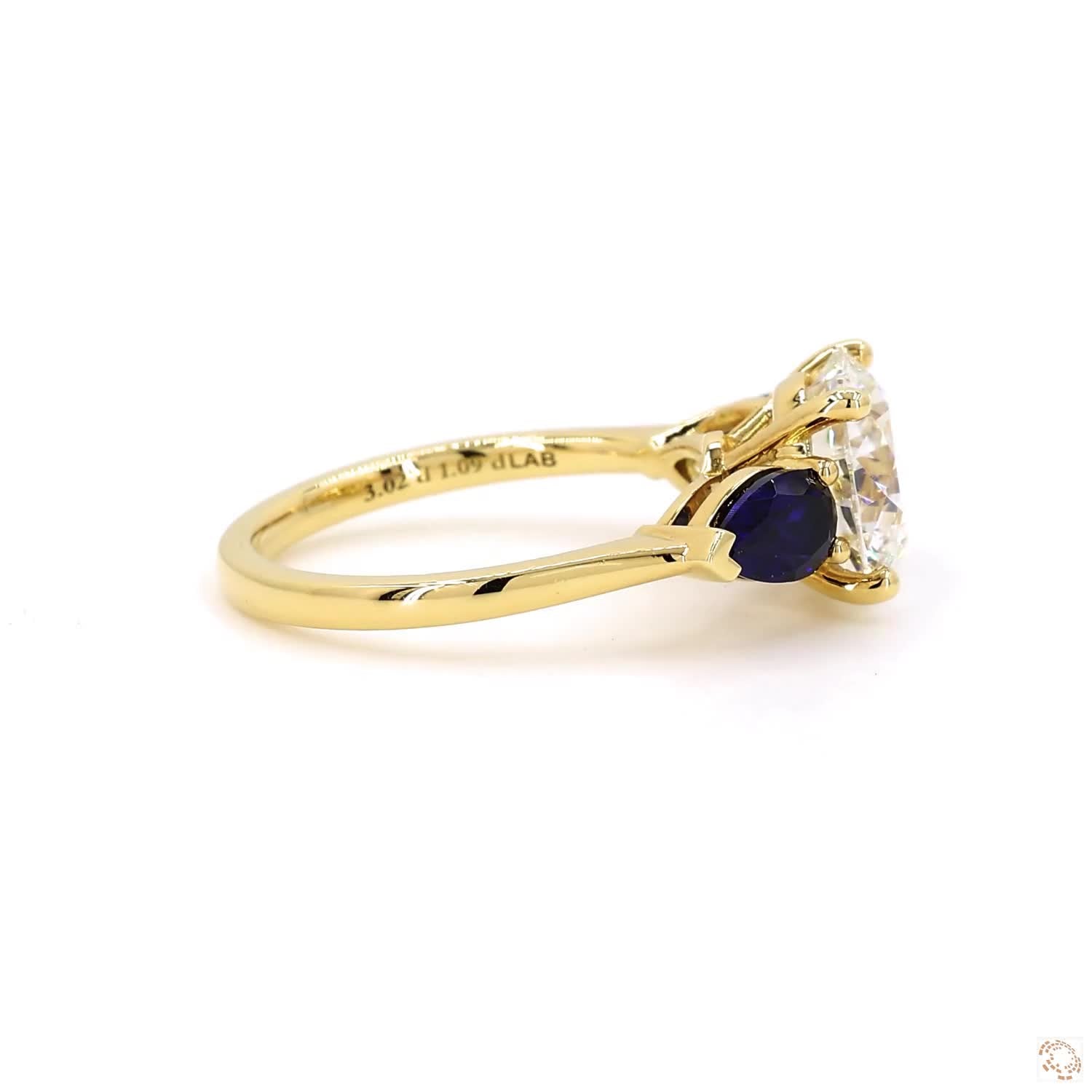 Three Stone Blue Sapphire And Diamond Engagement Ring