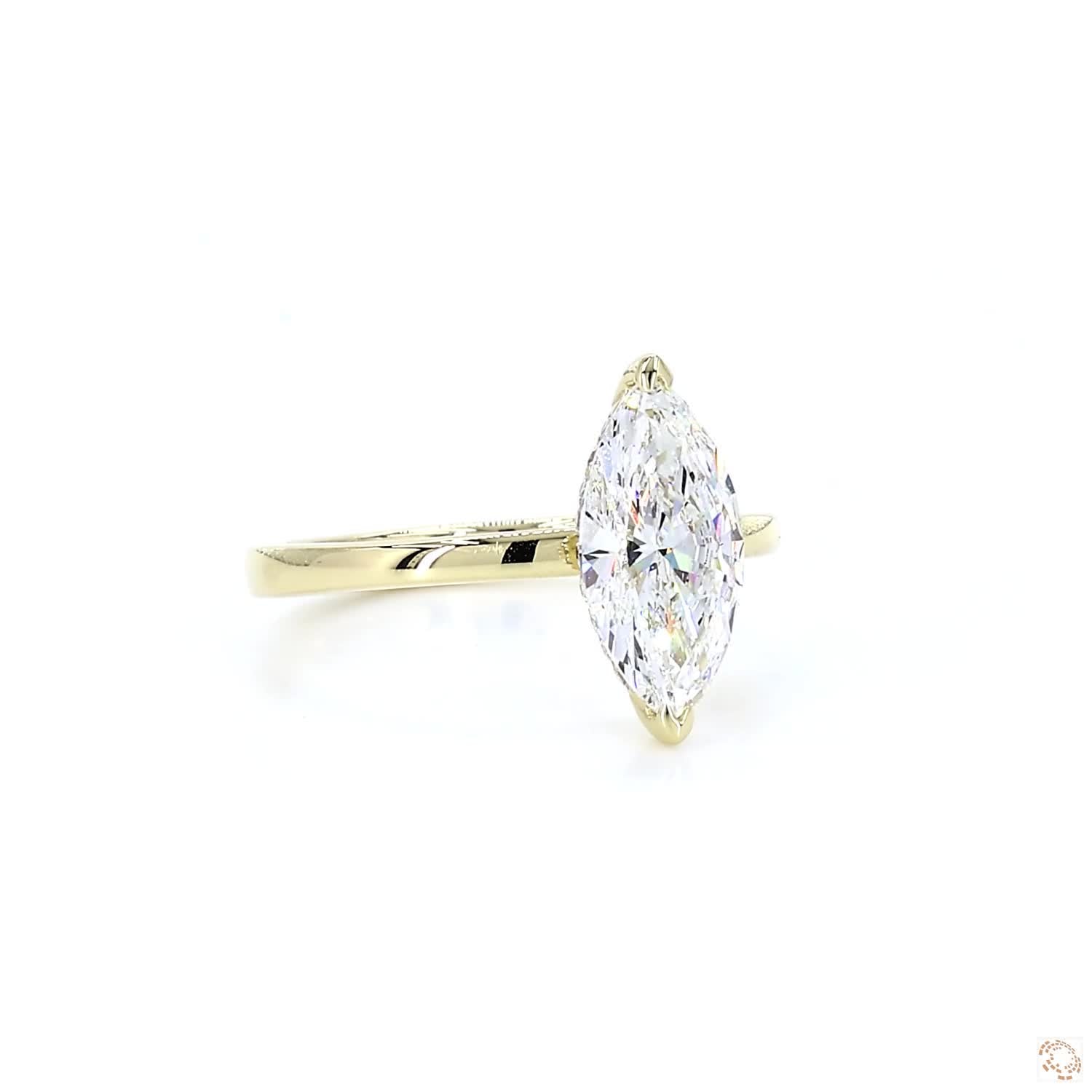 Marquise Shaped Diamond Engagement Ring with Hidden Halo