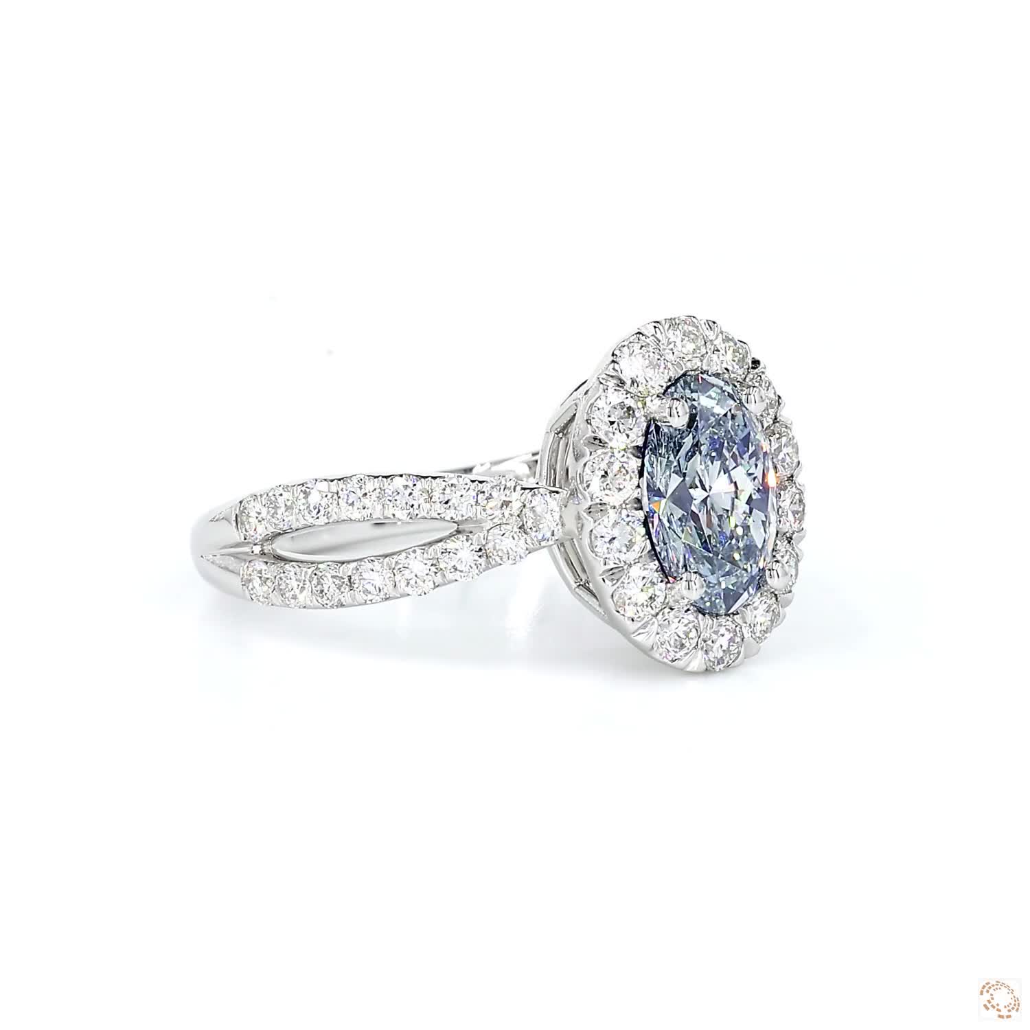 Blue Oval Diamond Halo Engagement Ring