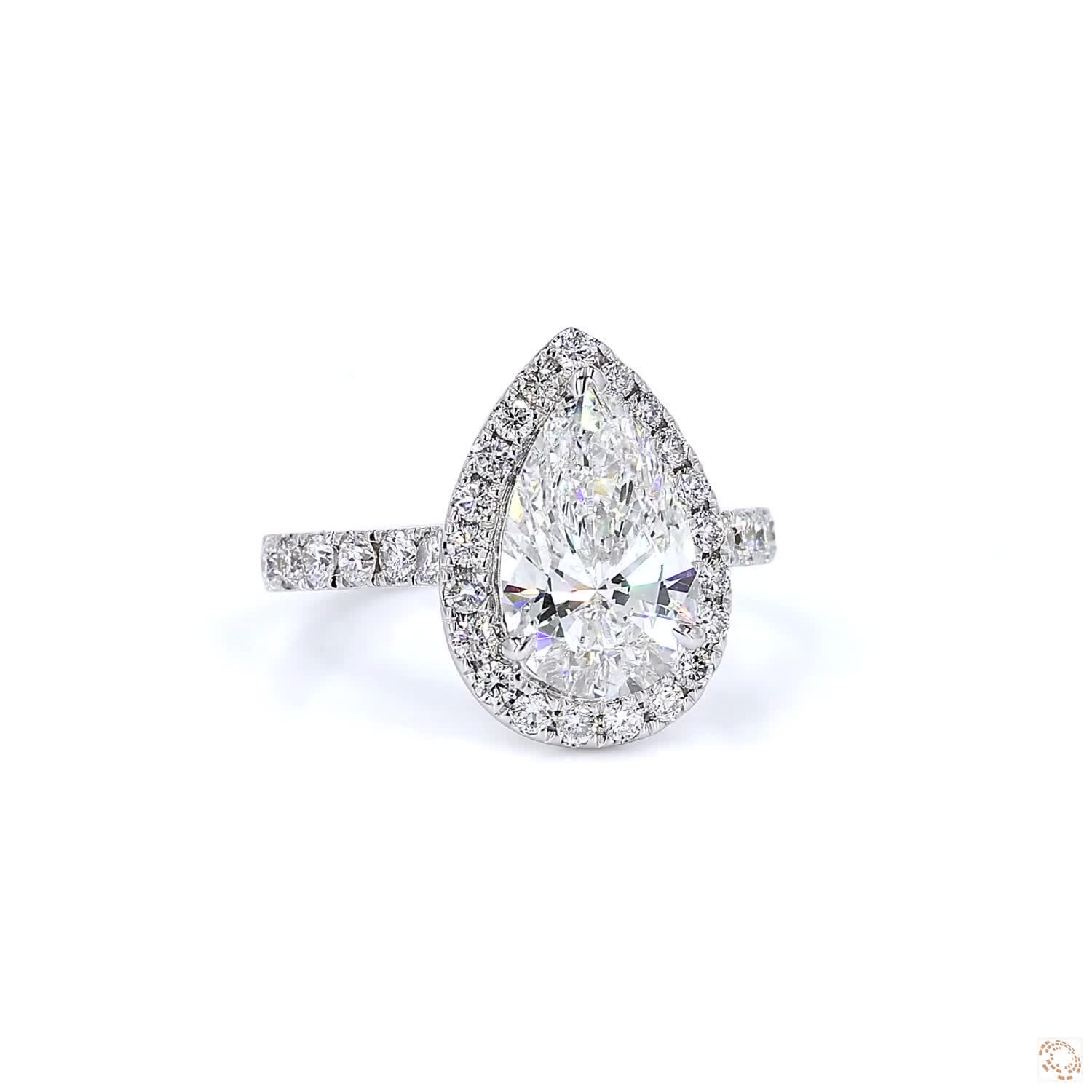 Pear Shape Halo Diamond Ring (2.16 per diamond)