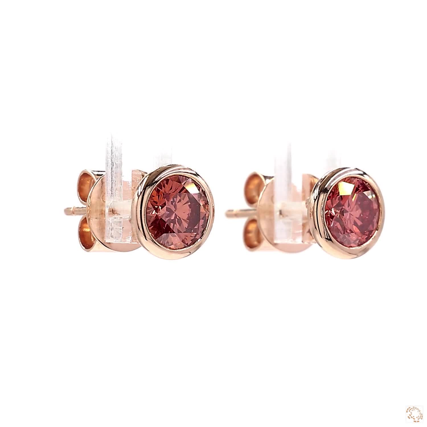 Round Fancy Intense Orange-Pink Diamond Stud Earrings