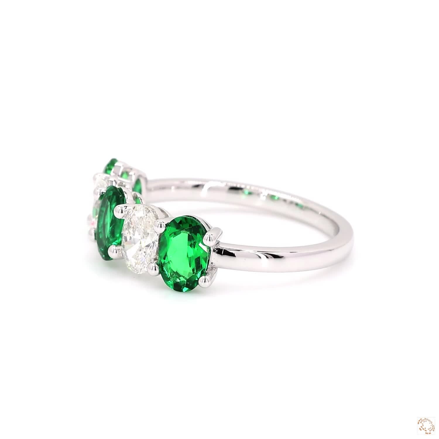 Oval Shaped Emerald and Diamond Ring