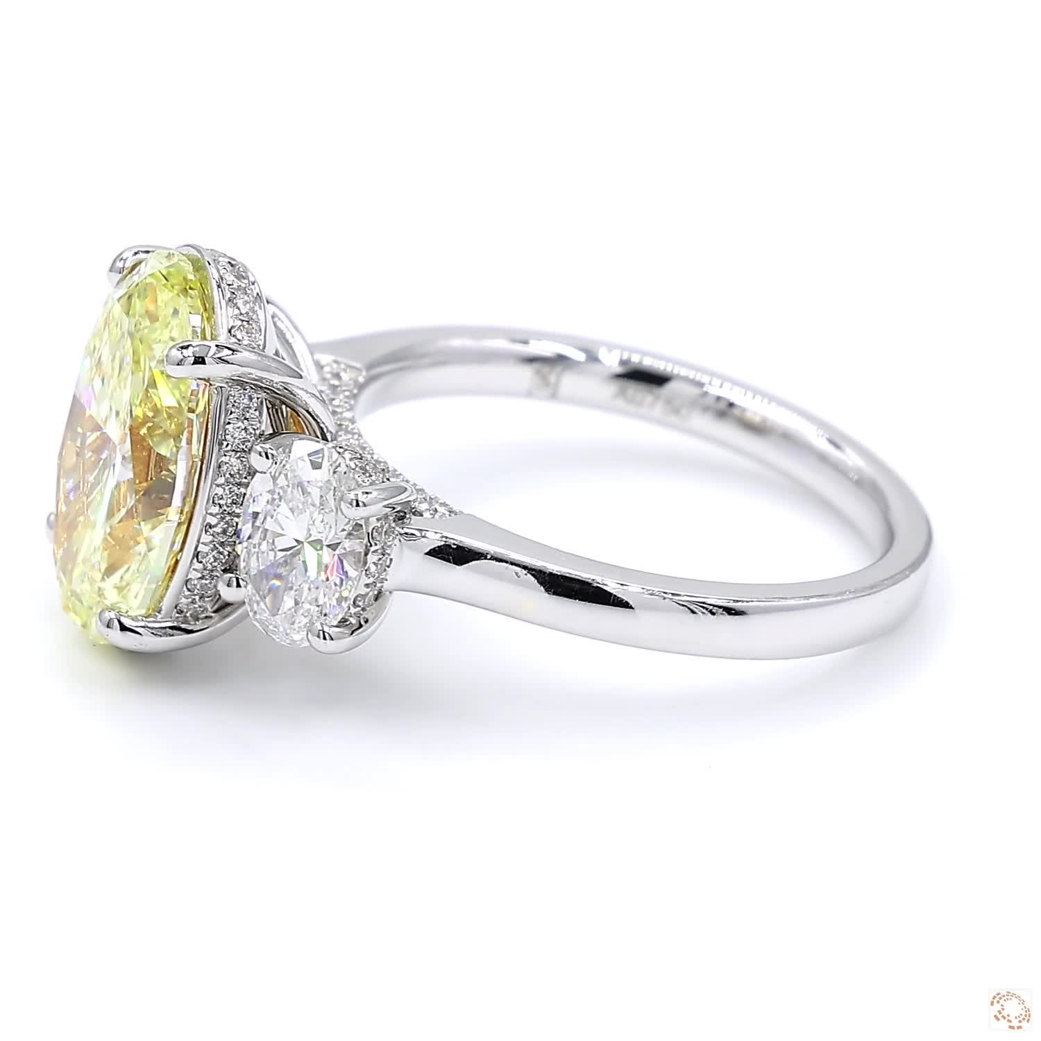 Three Stone Oval Fancy Yellow Diamond Engagement Ring