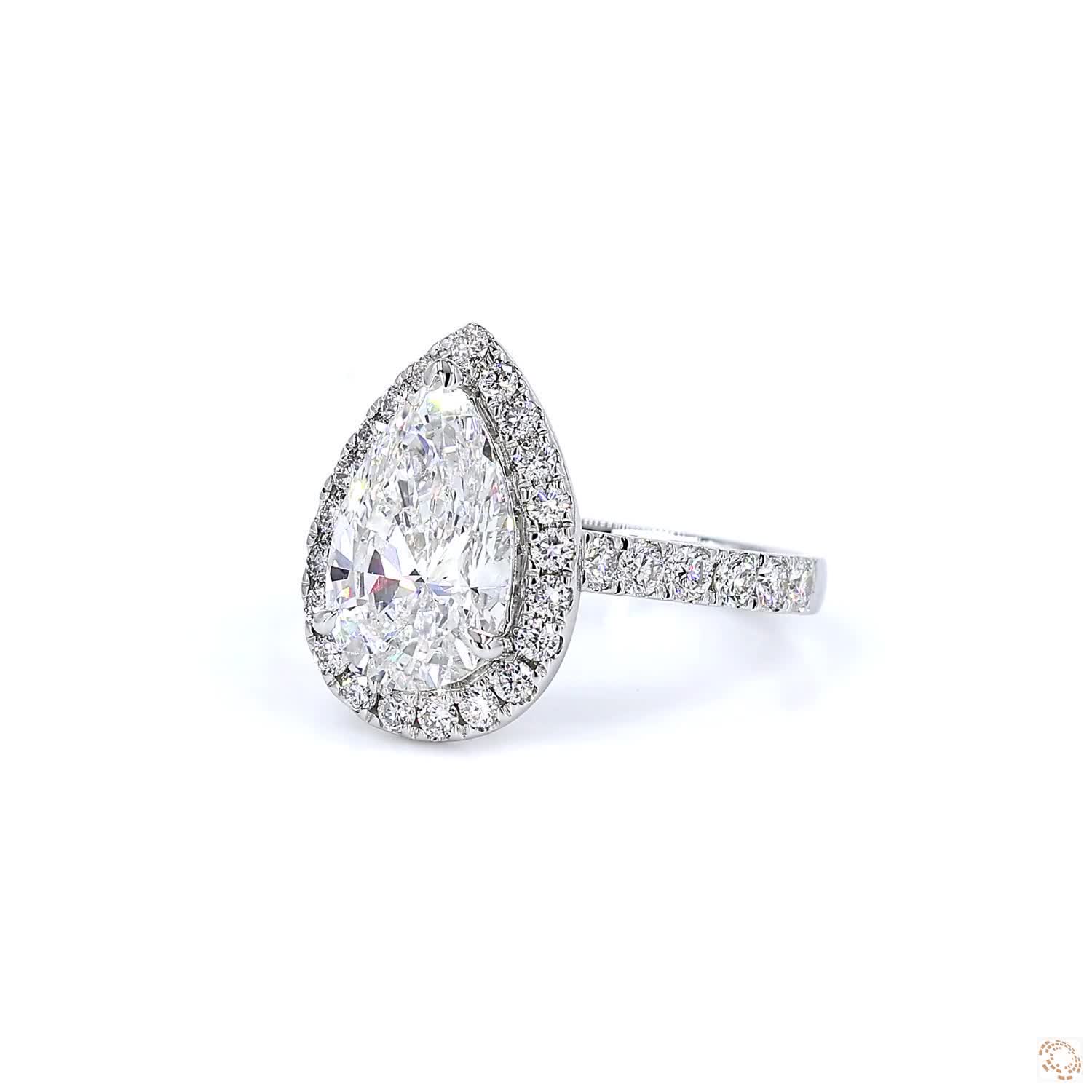Pear Shape Halo Diamond Ring (2.16 per diamond)