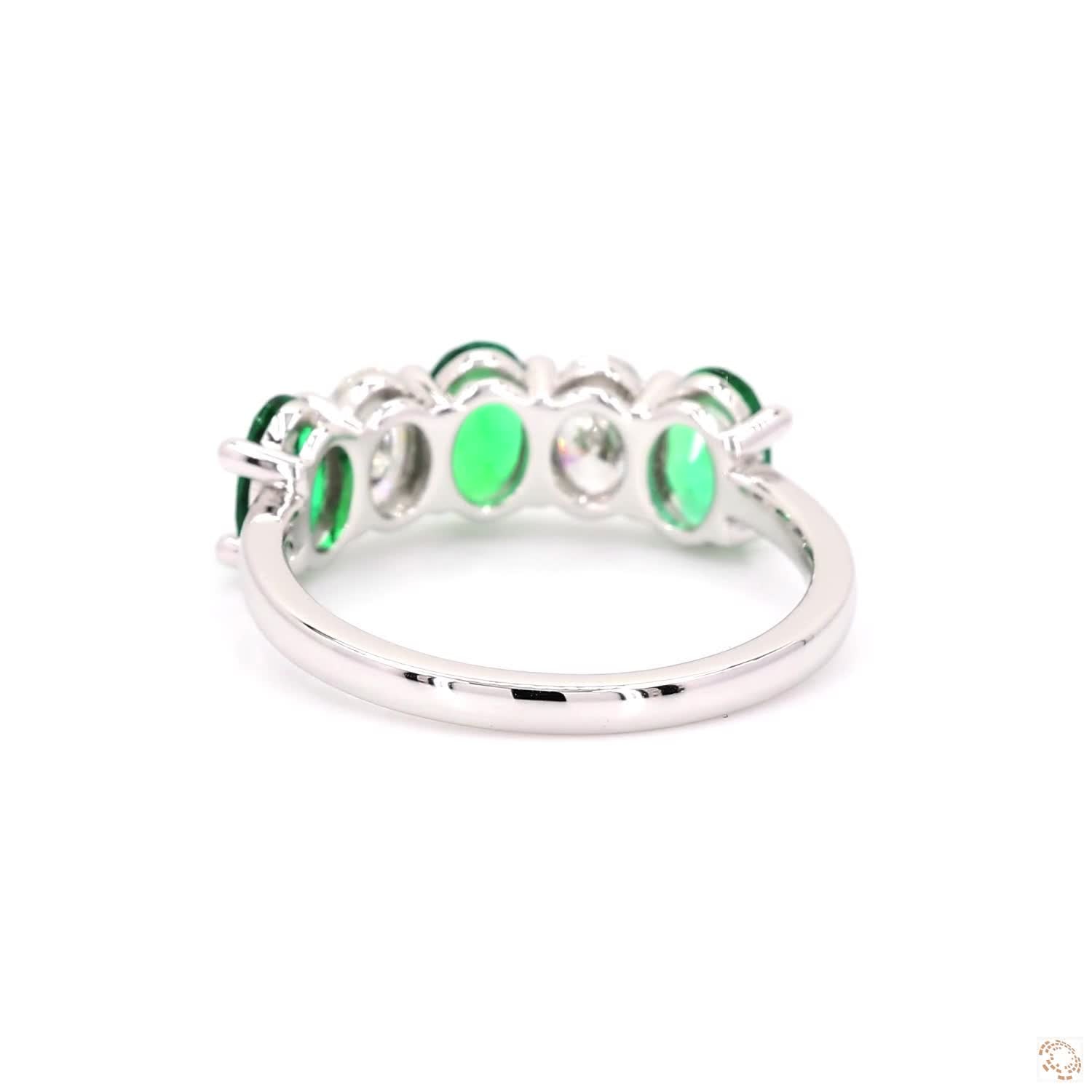 Oval Shaped Emerald and Diamond Ring