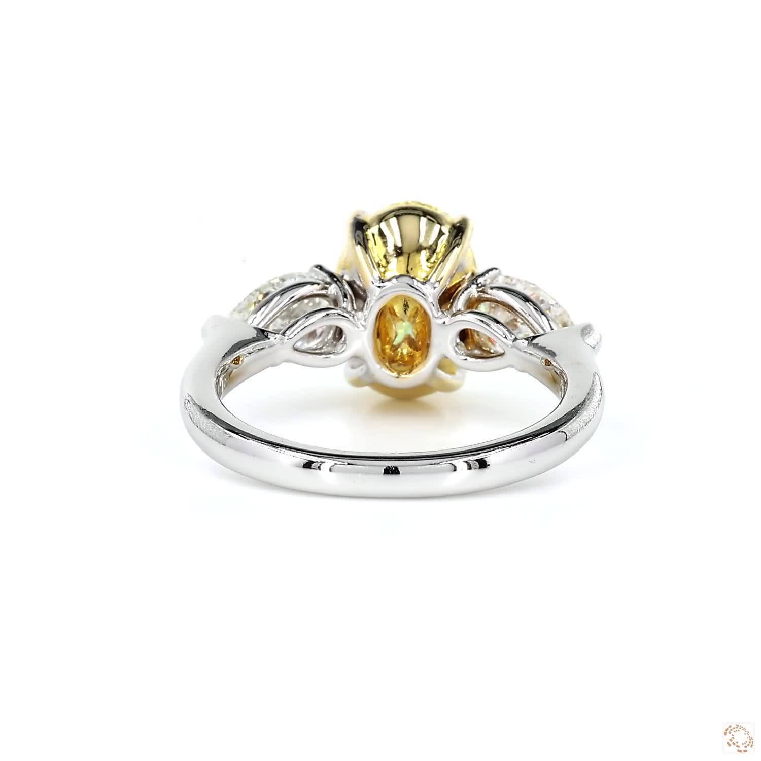 Oval Fancy Intense Yellow Three-Stone Diamond Ring
