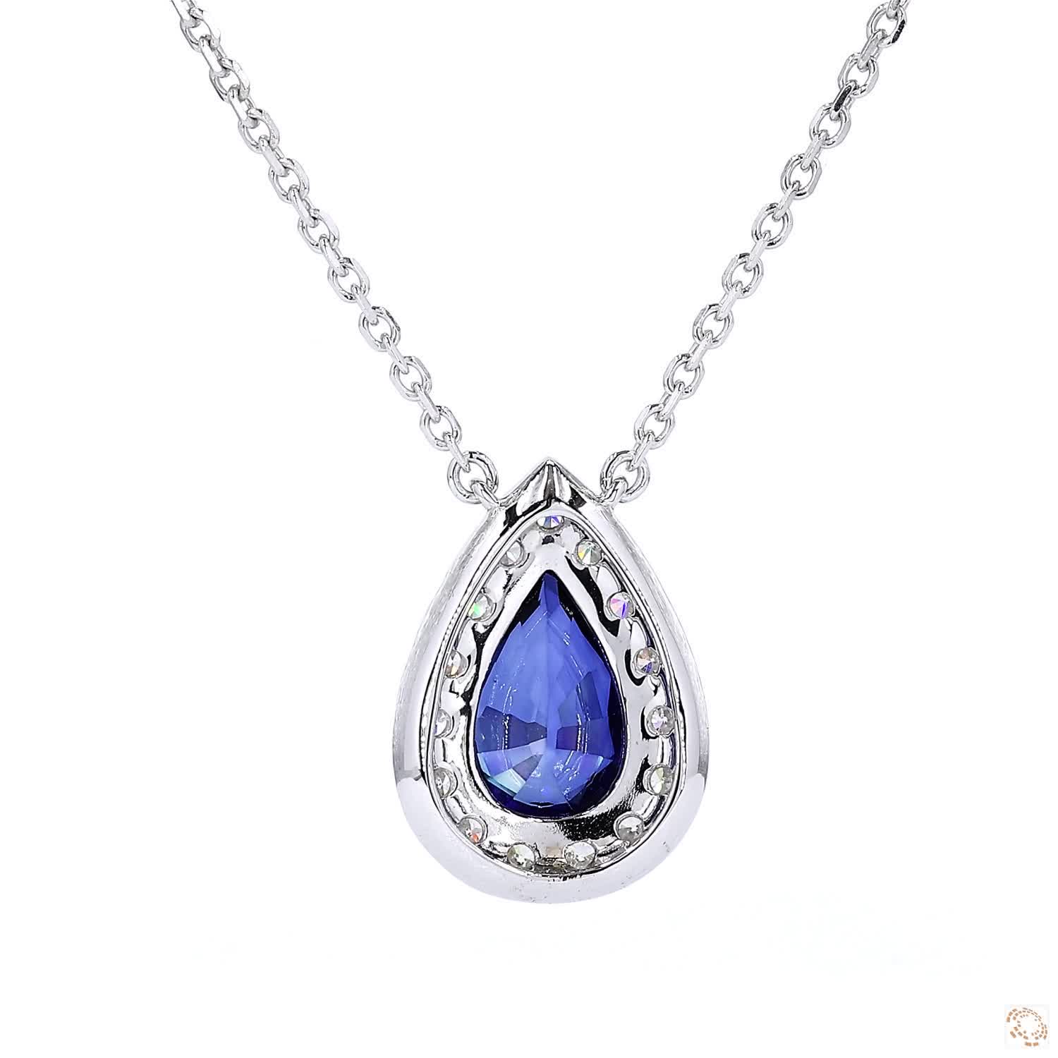 Lab Grown Blue Pear Shape Sapphire Halo Pendant