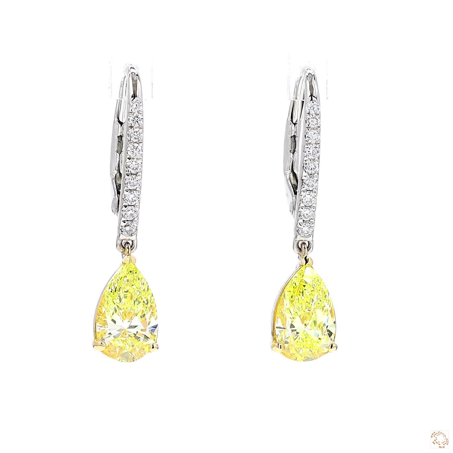 Pear Shaped Yellow and White Diamond Drop Earrings (1 ct Each )