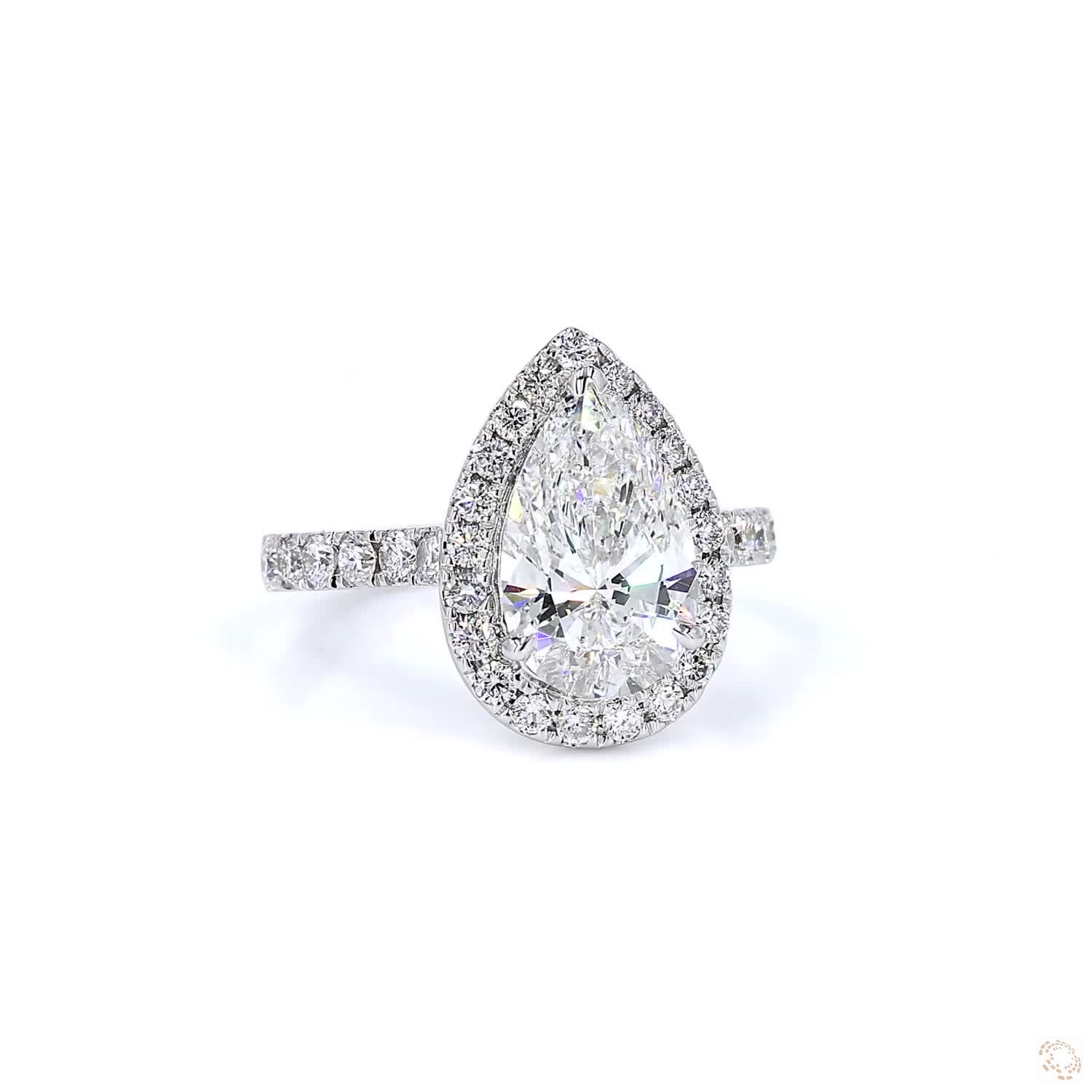 Pear Shape Halo Diamond Ring (2.16 per diamond)