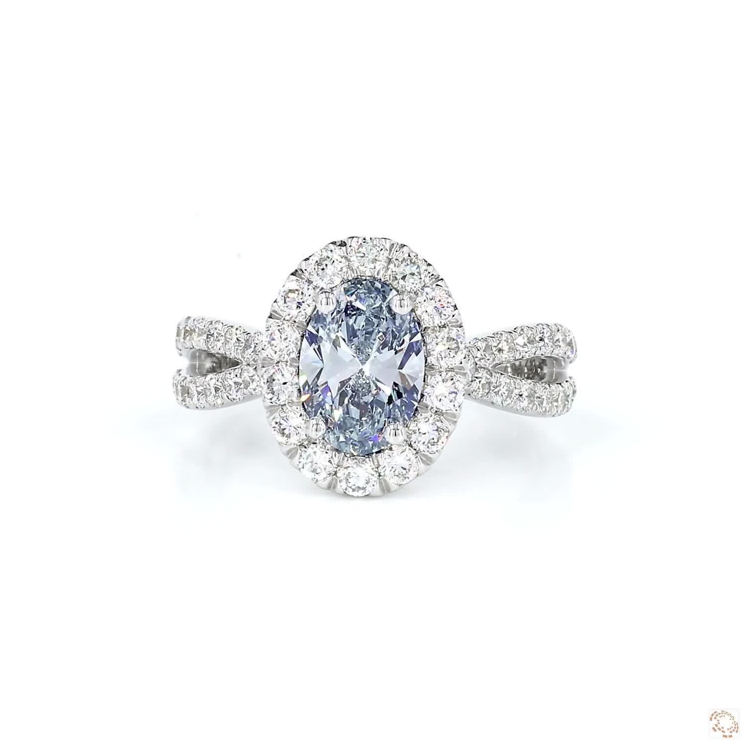 Blue Oval Diamond Halo Engagement Ring