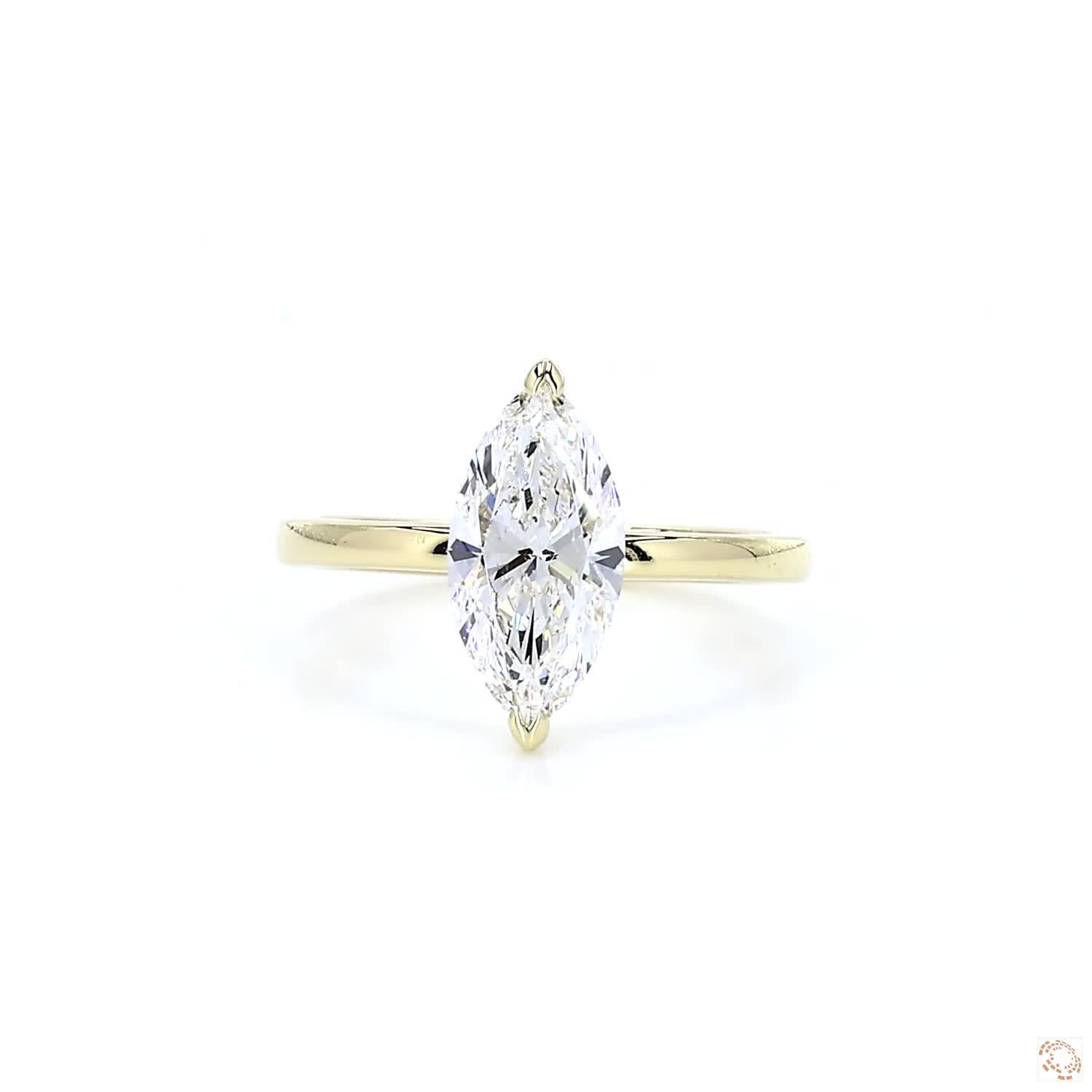 Marquise Shaped Diamond Engagement Ring with Hidden Halo