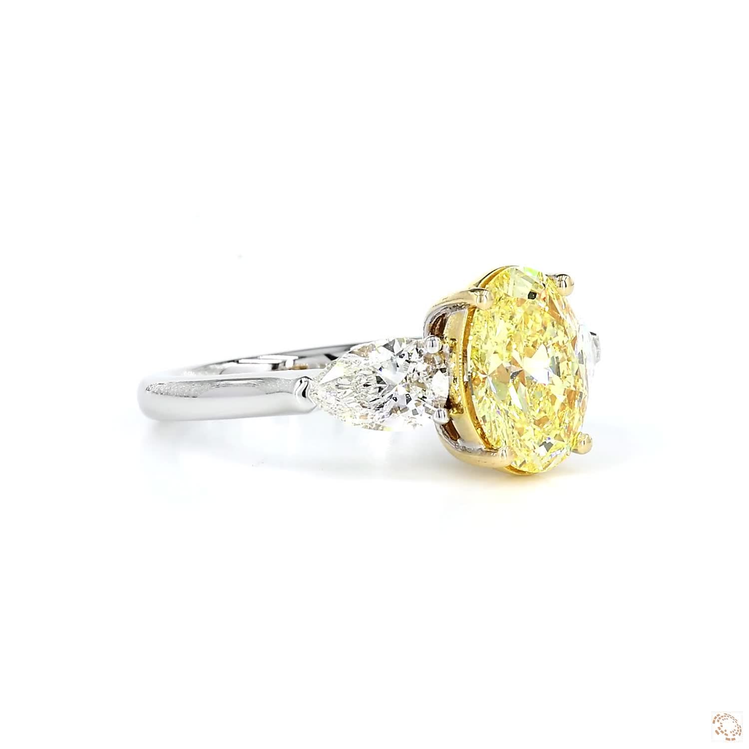 Oval Fancy Intense Yellow Three-Stone Diamond Ring