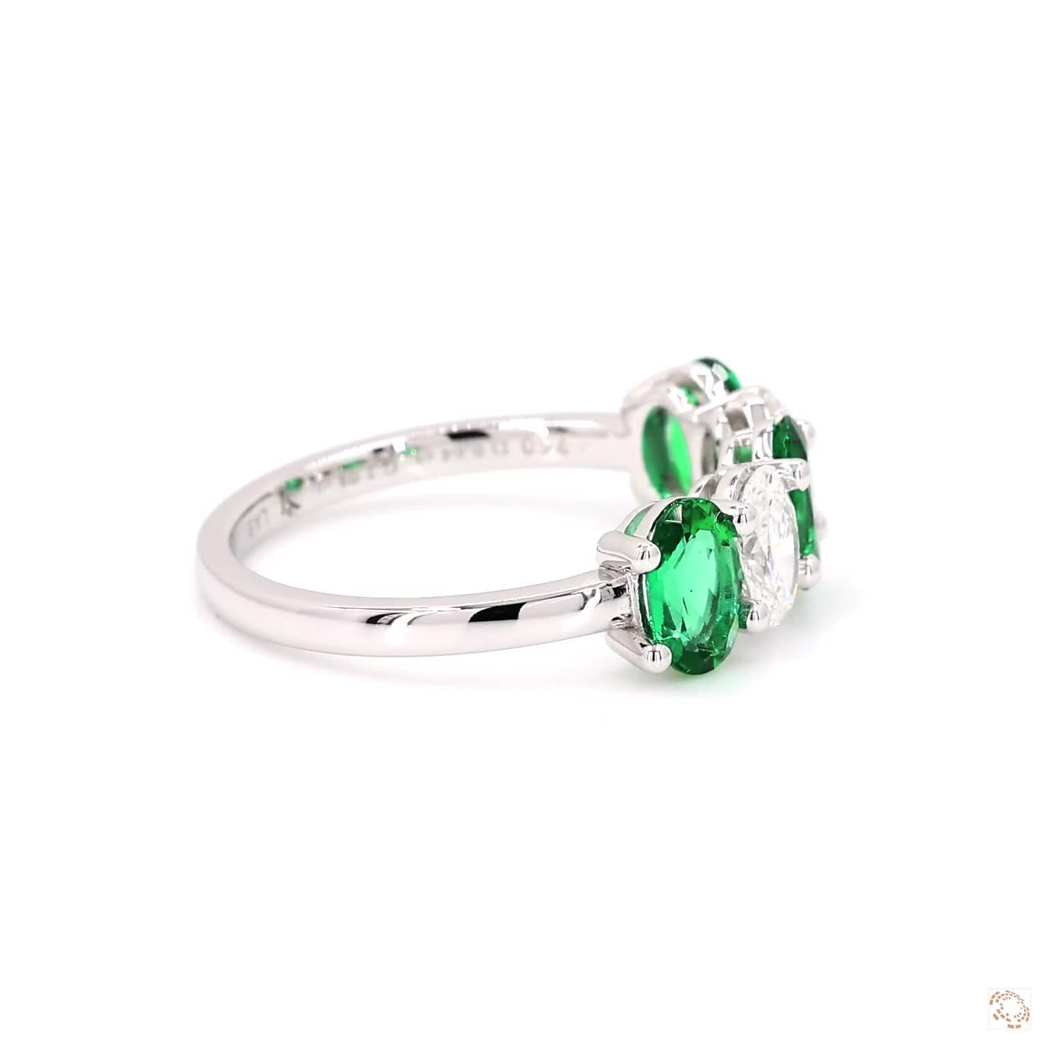 Oval Shaped Emerald and Diamond Ring