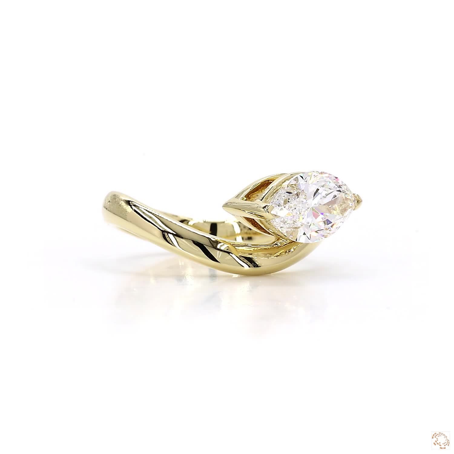 East-West Marquise Swirl Diamond Ring