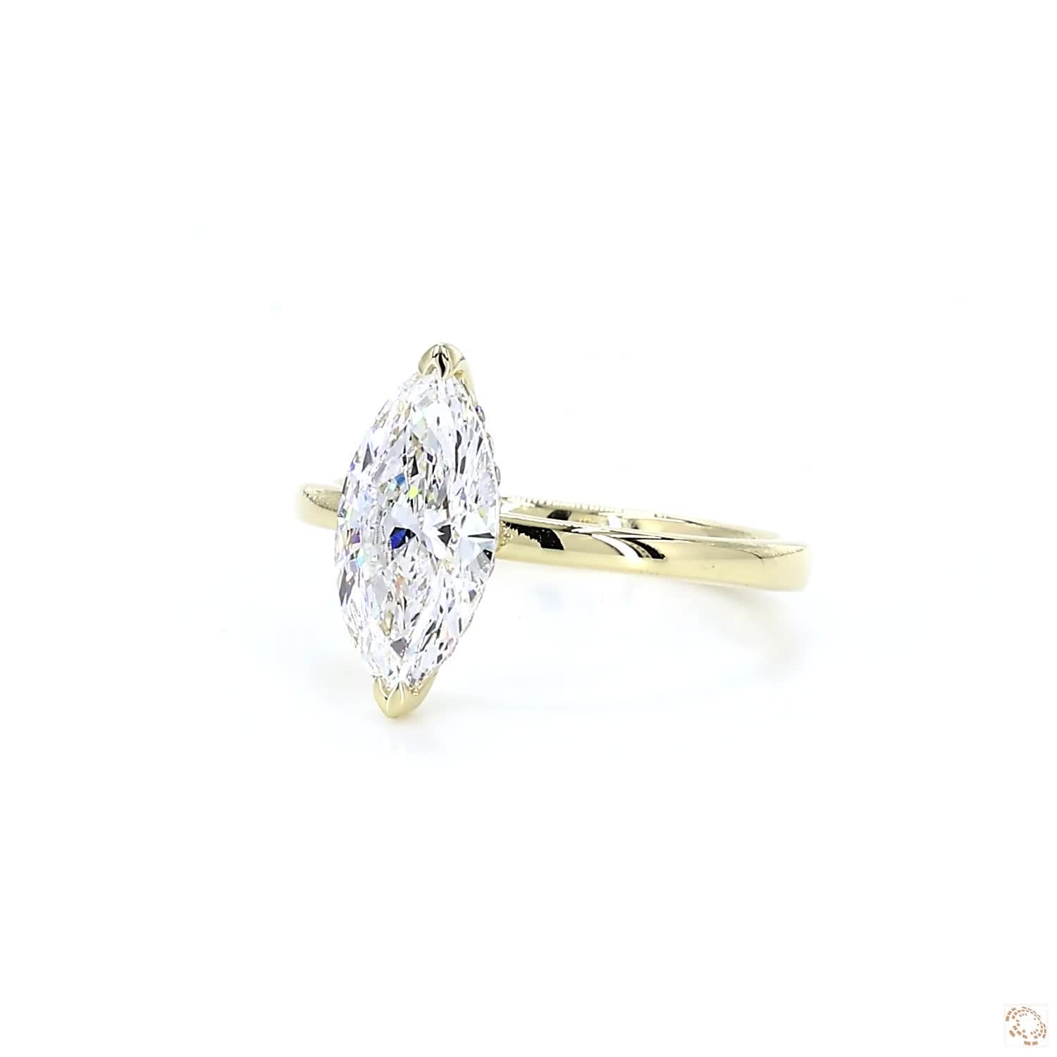 Marquise Shaped Diamond Engagement Ring with Hidden Halo