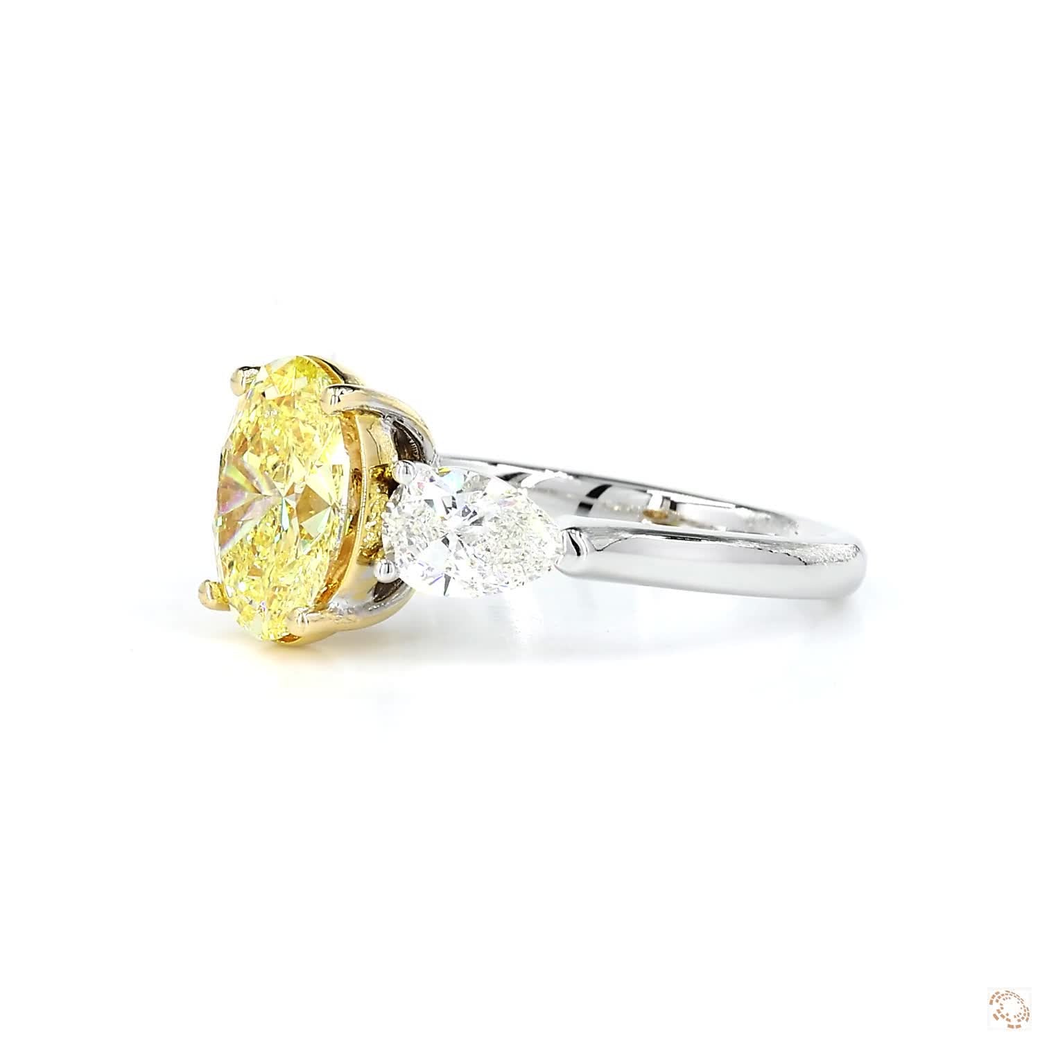 Oval Fancy Intense Yellow Three-Stone Diamond Ring