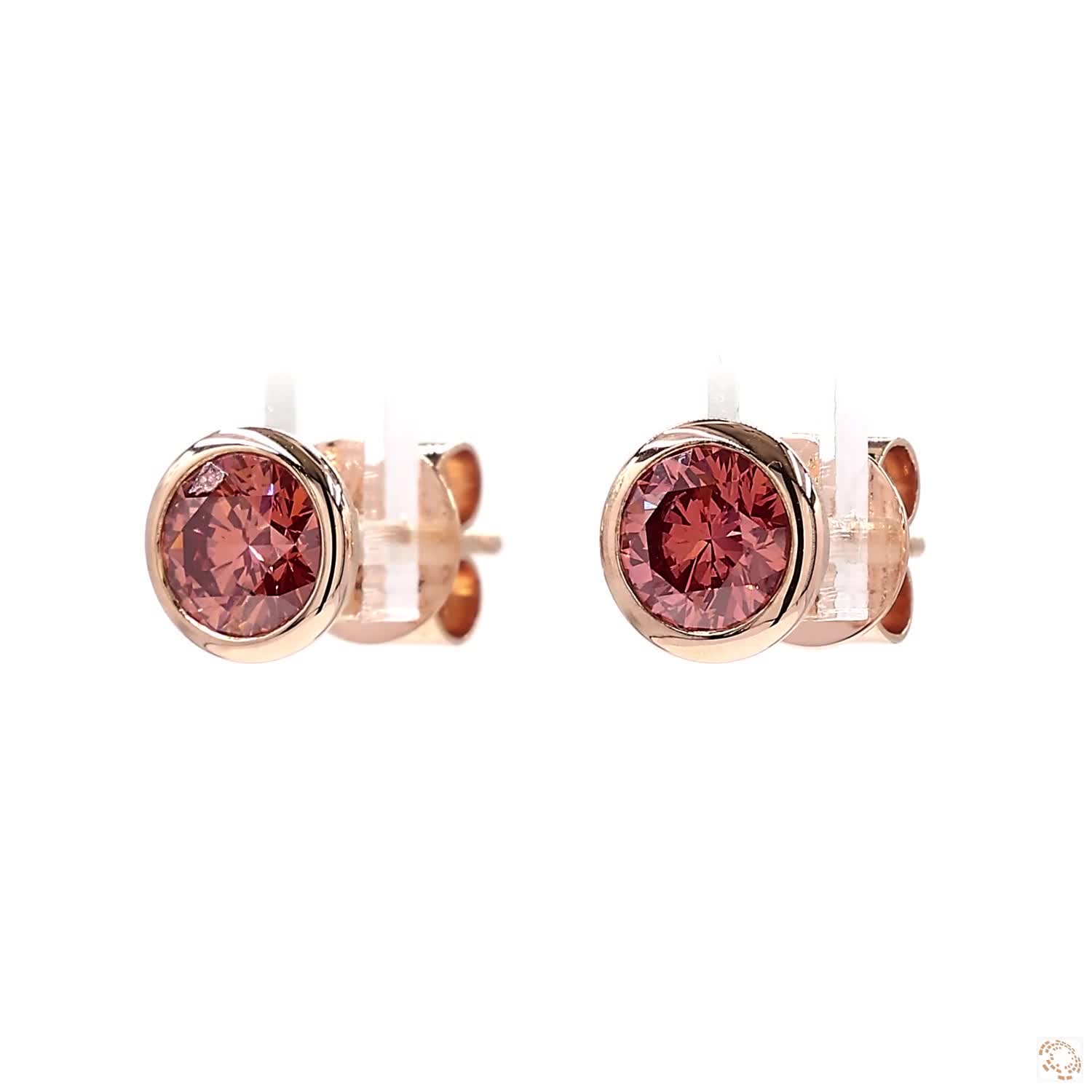 Round Fancy Intense Orange-Pink Diamond Stud Earrings